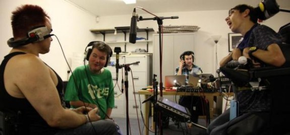 Musicians recording in a studio