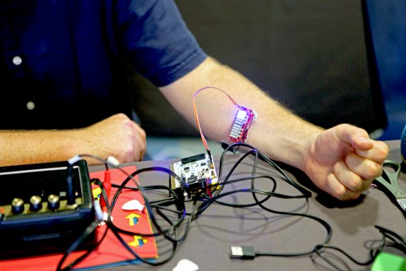Hacked instrument using a muscle movement sensor, powered by Bela
