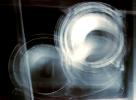 white/grey swirls on black background