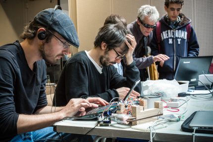 Coders working hard on new technology