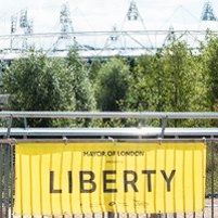 Image: Olympic staium with yellow Liberty banner