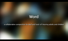 Image: Video still showing blurred ornages and blues with text: 'Word - A collaborative composition by deaf & hard of hearing adults and children'.
