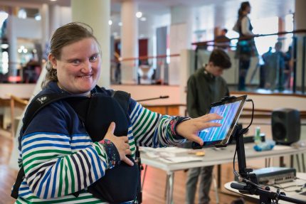 Katie Fraser with iPad and SubPac