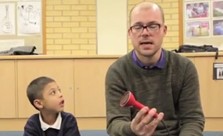 Music leader uses a soundbeam with young musician