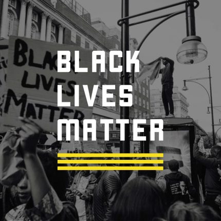 Black Lives Matter written over a black and white photo of a protest