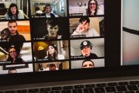 Young people's faces appear on a computer screen in a zoom call