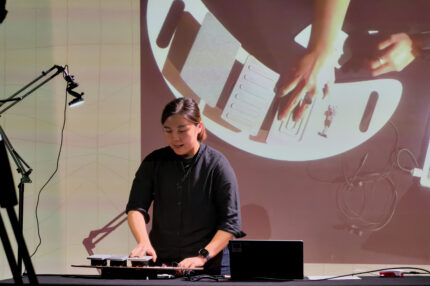 Cheryl presenting her instrument, Sound of Joy, at DMLab Festival.